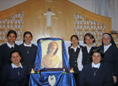 Sisters with a picture of the Christ