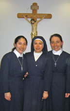 Three sisters smiling